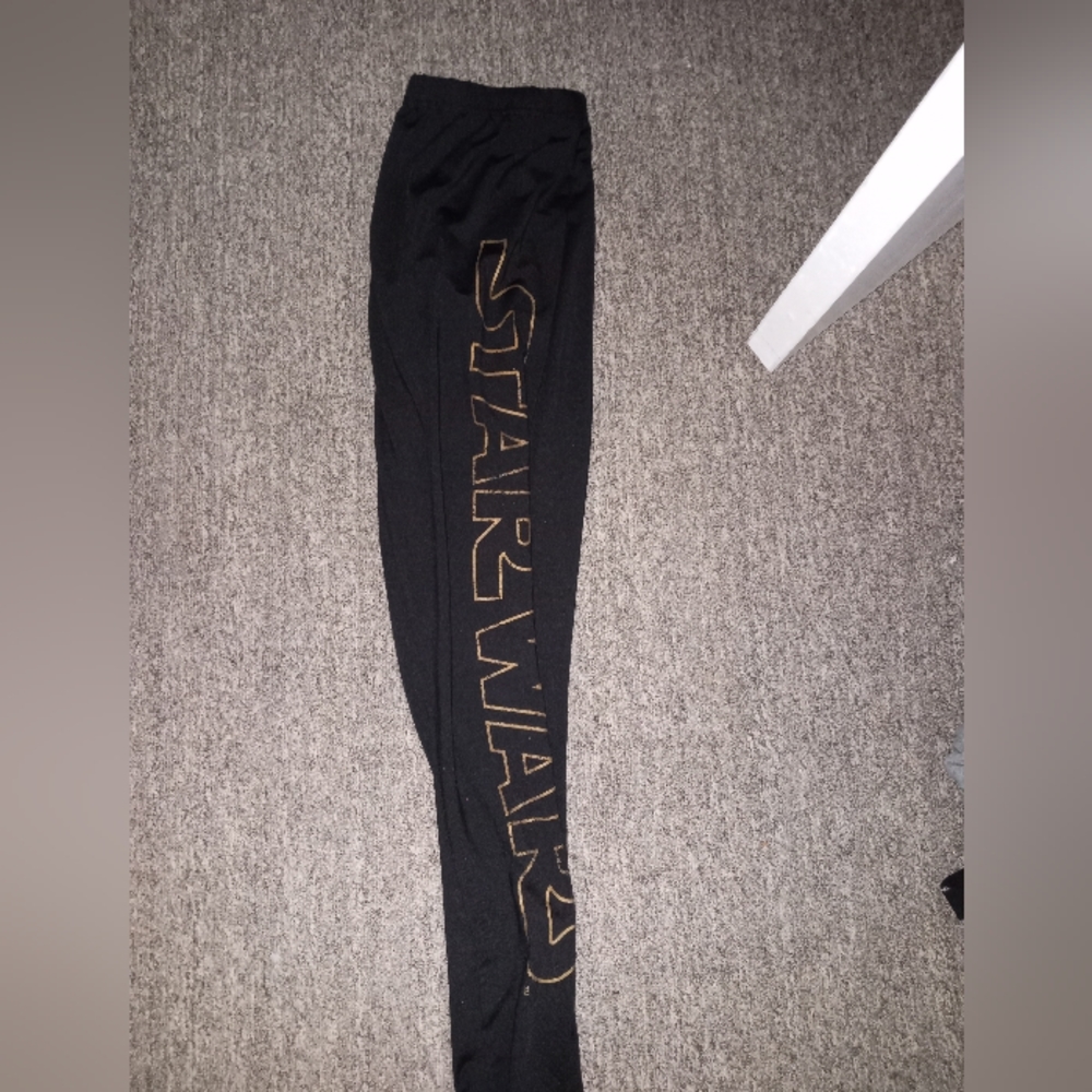 Star Wars black and gold metallic logo leggings size small